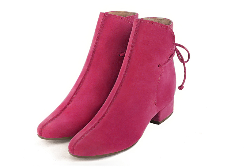 Fuschia pink women's ankle boots with laces at the back. Round toe. Low block heels. Front view - Florence KOOIJMAN